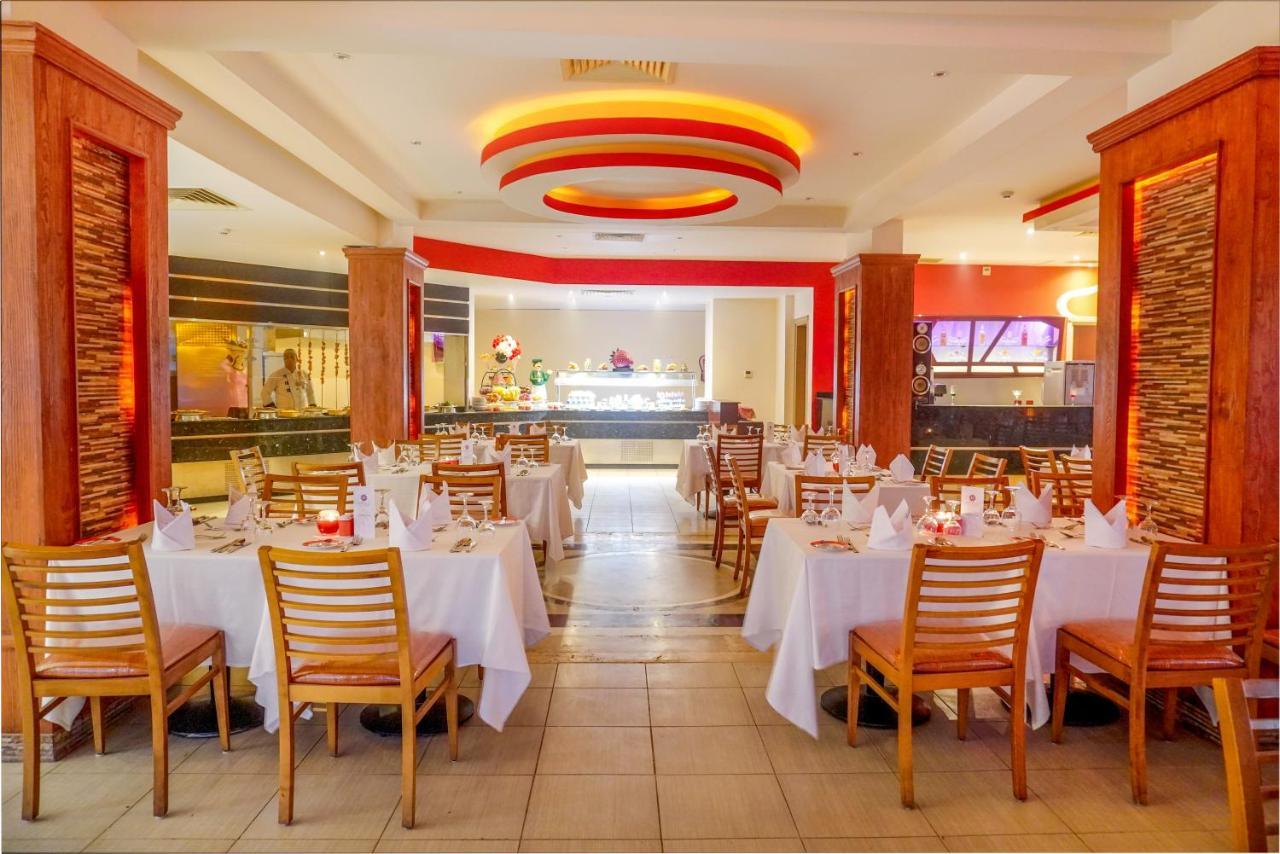 Готель Charmillion Club Aquapark Шарм-еш-Шейх Екстер'єр фото The interior of the restaurant