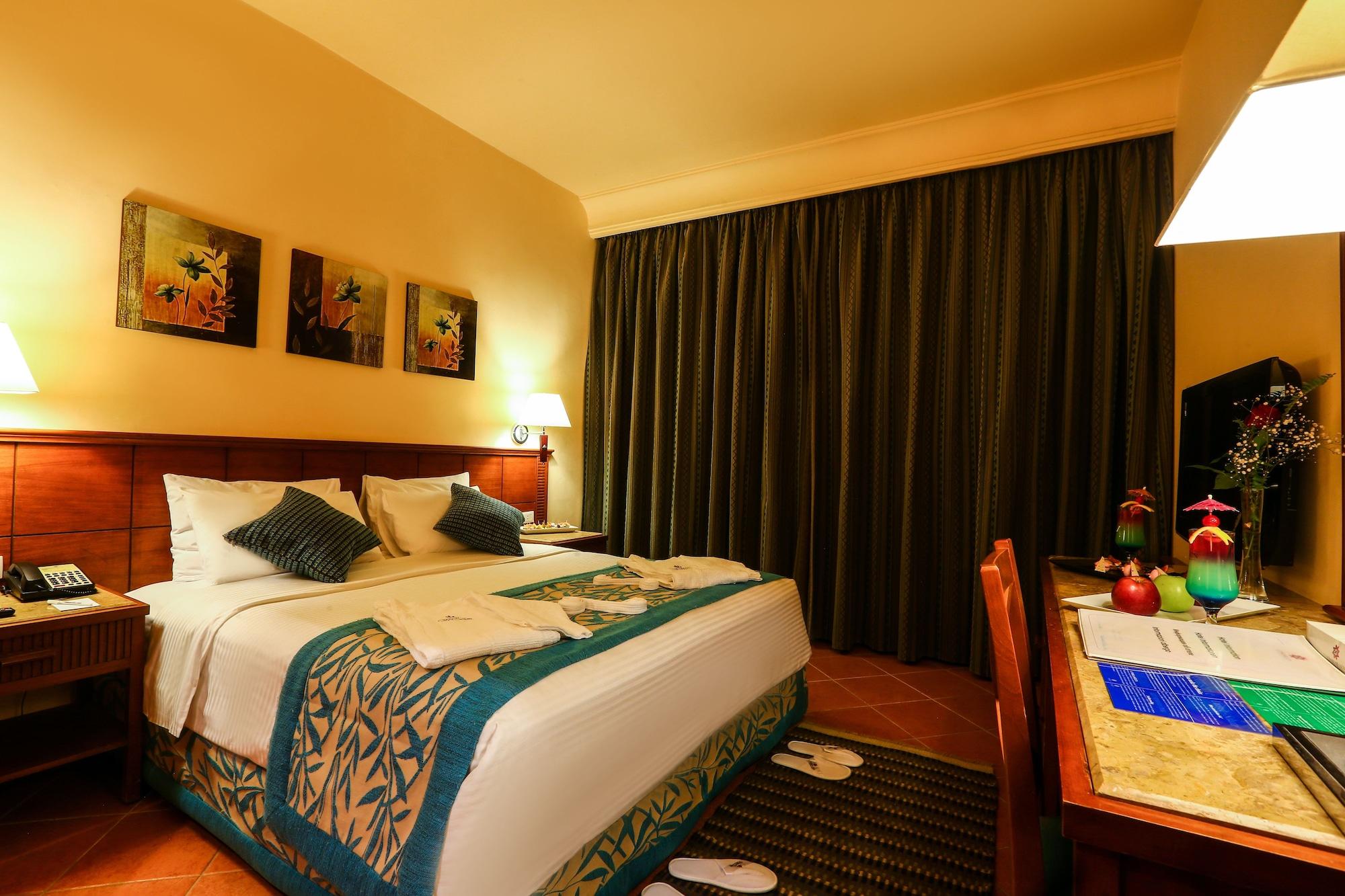 Готель Charmillion Club Aquapark Шарм-еш-Шейх Екстер'єр фото A bedroom at the hotel